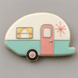 Decorative cookie shaped like a vintage camper on a gray background from a  4.5 inch Camper RV Metal Cookie Cutter