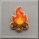 Campfire cookie cutter on a gray background with from a 3.5 inch Campfire Metal Cookie Cutter