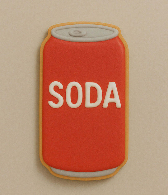 Cookie shaped like a soda can with 'SODA' text on a beige background from a 4 inch Soda Pop Beer Can Metal Cookie Cutter