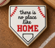 Cookie shaped like a home plate with 'there is no place like HOME' text on a baseball field background made from a 3 inch Home Plate Metal Cookie Cutter