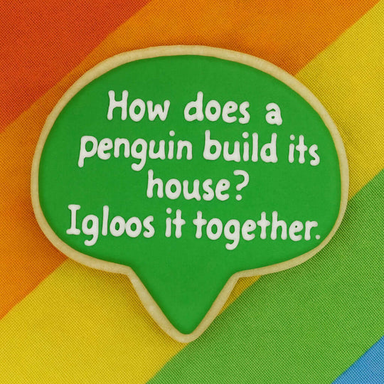 Green speech bubble with a humorous penguin joke on a colorful striped background
