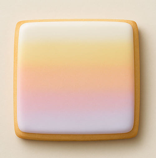 Square cookie with a gradient of pink, orange, and white on a beige background from a 3.5 inch Square Biscuit Metal Cookie Cutter