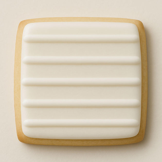 Square ceramic plate with a wooden rim on a beige background from a 5 inch Square Biscuit Metal Cookie Cutter