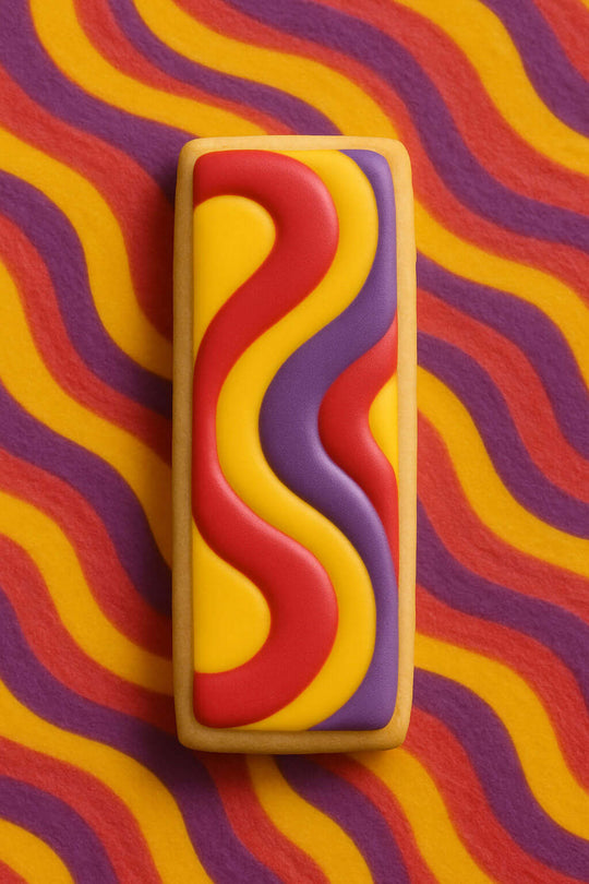 Rectangular cookie with wavy red and yellow pattern on a wavy red and yellow background