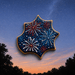 Decorative cookie with firework design against a night sky with trees from a 3.25 inch Pow Bam Smack Comic Book Words Metal Cookie Cutter