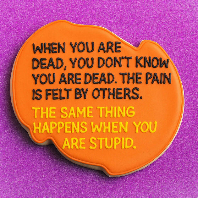 Orange plaque with text on a purple background