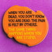 Orange plaque with text on a purple background