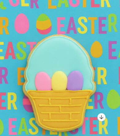 Easter-themed cookie with colorful eggs on a blue background with 'Easter' text from a 4.5 inch Easter Basket Metal Cookie Cutter