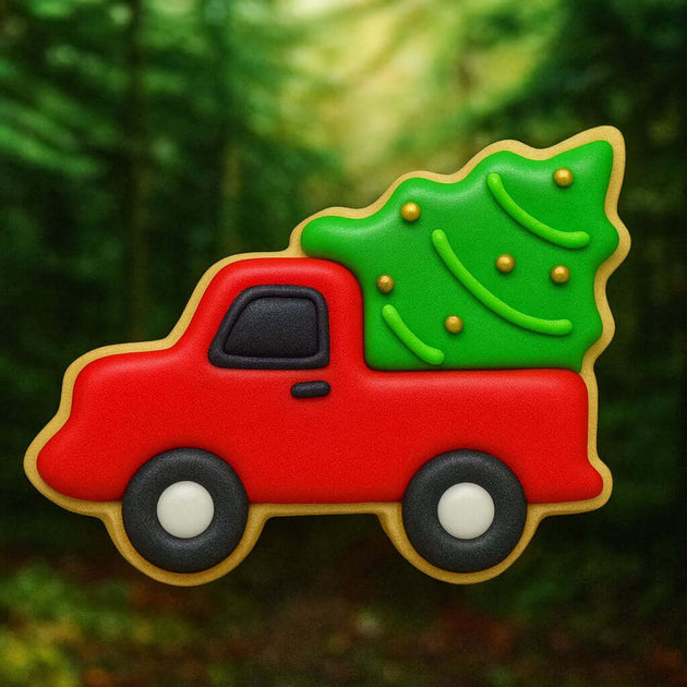 Red toy truck with a green Christmas tree on a forest background from a 2.5 inch Mini Truck with Tree Metal Cookie Cutter