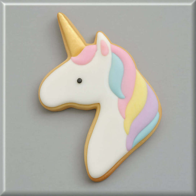 Unicorn-shaped cookie with pastel colors on a gray background from a 2.5 inch Mini Unicorn Metal Cookie Cutter