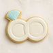 Cookie shaped like a wedding ring with a blue gemstone on a white background from a 1.75 inch Mini Double Wedding Rings Metal Cookie Cutter