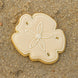 Decorative sand dollar cookie on a sandy surface from a 1.5 inch Mini Sand Dollar or Hibiscus Metal Cookie Cutter