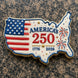 Cookie shaped like the United States with American flag design and 'America's 250' text on a textured surface from a 4.5 inch Map of the USA Metal Cookie Cutter