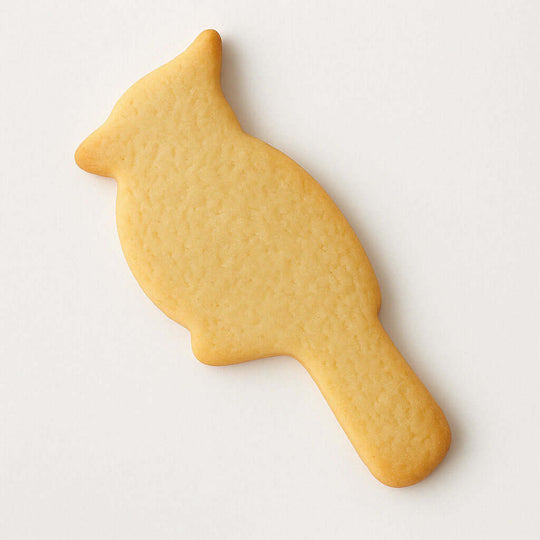 Bird-shaped cookie on a white background from a 4.5 inch Cardinal Metal Cookie Cutter