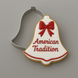 Red and white bell and cutter from a 3.5 inch Bell Metal Cookie Cutter