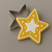 Decorated cookie and a 2.5 inch Star Metal Cookie Cutter