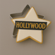 Star cookie with the word HOLLYWOOD  on it and 3.5 inch Star Metal Cookie Cutter