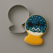 A Santa scene in a snow globe cookie with a 3.5 inch Snow Globe Metal Cookie Cutter