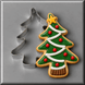 A Christmas tree decorated cookie and a 3 inch Folk Tree Metal Cookie Cutter