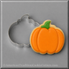 A 3 inch Pumpkin Metal Cookie Cutter shown beside a decorated pumpkin-shaped sugar cookie with orange icing and a green stem on a gray background.