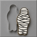 A 5 inch Mummy Metal Cookie Cutter next to a decorated ghost-shaped cookie with white icing, black banding details, set against a solid gray background.