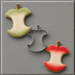 Green and red air brushed cookies along with the cutter from a 4 inch Apple Core Metal Cookie Cutter