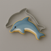 A dolphin decorated cookie and a 4.5 inch Dolphin Metal Cookie Cutter