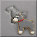 A 4.75 inch Schnauzer Metal Cookie Cutter behind a decorated dog cookie