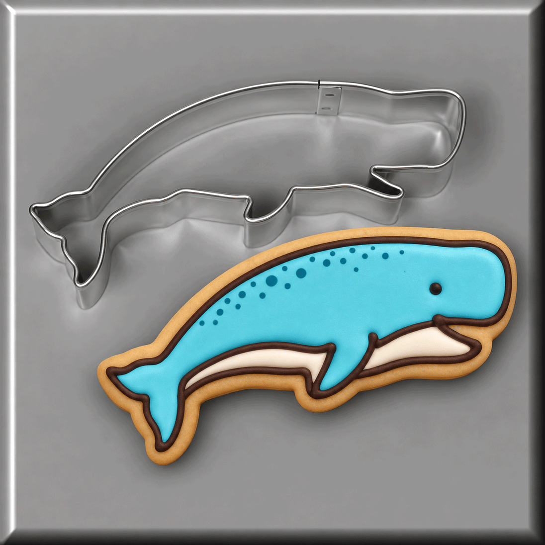 A blue whale cookie with a 4 inch Jumping Whale Metal Cookie Cutter
