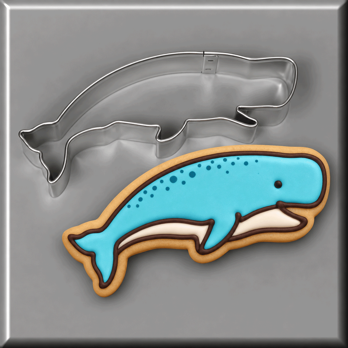 A blue whale cookie with a 4 inch Jumping Whale Metal Cookie Cutter