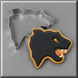 A black panther cookie with gold icing and a pink tongue, shown next to a 3.5 inch Panther Head Metal Cookie Cutter on a gray background.