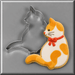 A 4.5 inch Cat Metal Cookie Cutter positioned beside a decorated sugar cookie shaped like a white cat with orange patches and a red bow, on a gray background.