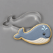 A gray and white whale cookie and a 4 inch Whale Metal Cookie Cutter
