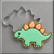 Green and tan dinosaur cookie and a 4 inch Stegosaurus Metal Cookie Cutter