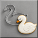 White swan cookie next to a 4 inch Swan Metal Cookie Cutter