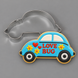 Compact car decorated cookie with LOVE BUG written on it next to a 3.5 inch Compact Car Metal Cookie Cutter