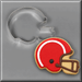 Cookie decorated in red and white as a football helmet along side a 4.5 inch Football Helmet Metal Cookie Cutter