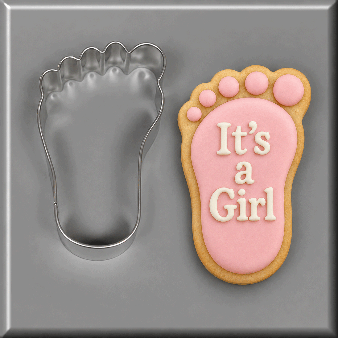 Pink foot cookie that says It's a Girl and a 3.5 inch Left Foot Metal Cookie Cutter