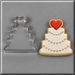  A 4.25 inch Wedding Cake Metal Cookie Cutter next to a white wedding cake cookie with heart on top