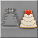  A 4.25 inch Wedding Cake Metal Cookie Cutter next to a white wedding cake cookie with heart on top
