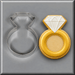 A 3.75 inch Diamond Engagement Ring Metal Cookie Cutter shown next to a decorated ring-shaped sugar cookie with a white diamond design and gold band, on a gray background.