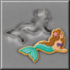 A 4 inch Mermaid Metal Cookie Cutter shown above a decorated sugar cookie of a mermaid with a turquoise tail, brown hair, and a purple shell, on a gray background.
