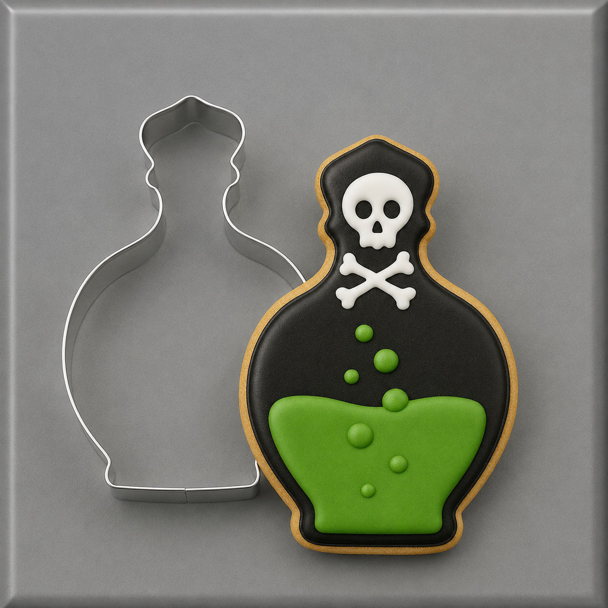 Decorated potion bottle cookie and cutter from a 4.25 inch Perfume Potion or Genie Bottle Metal Cookie Cutter
