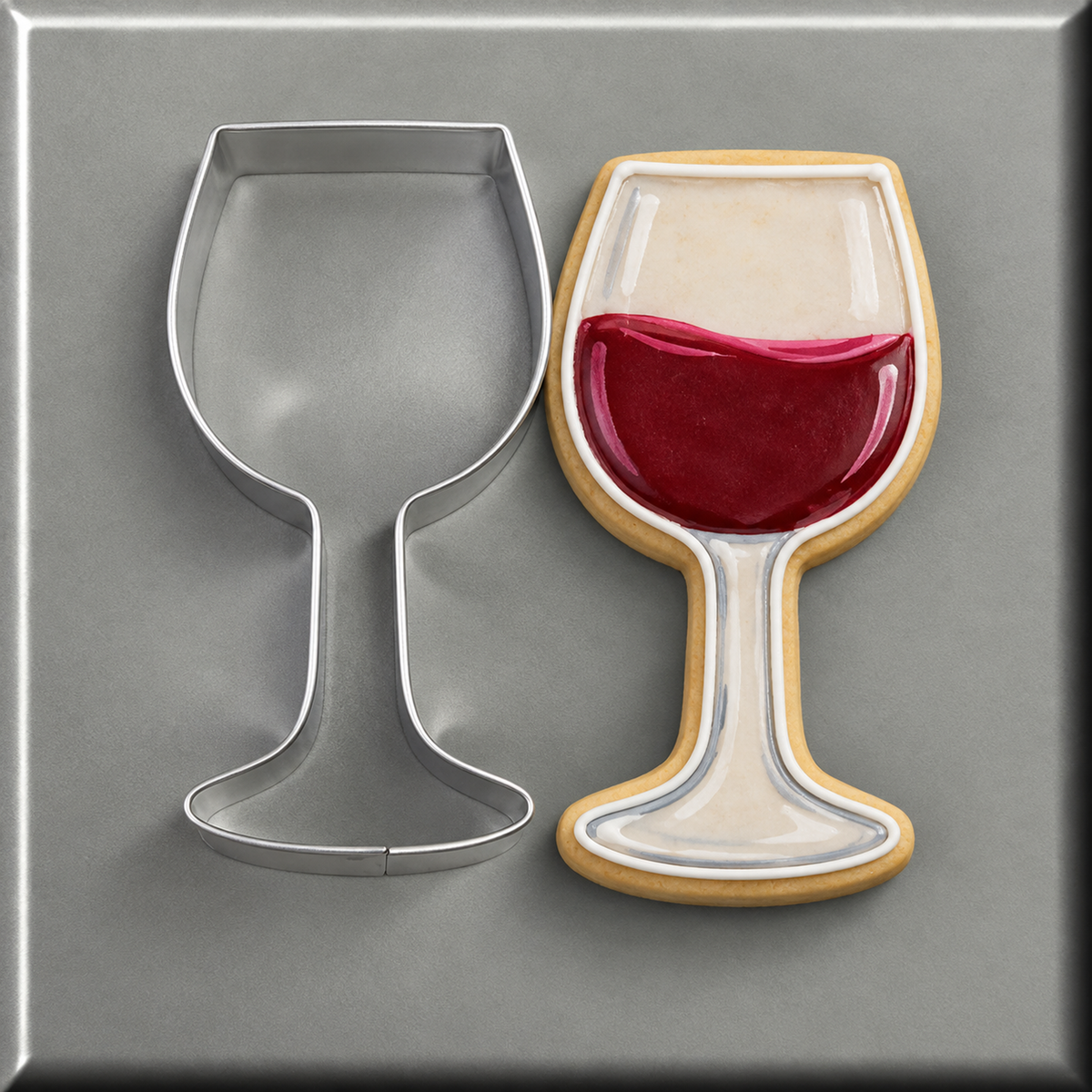 A red wine glass of wine cookie and a 4 inch Wine Glass Metal Cookie Cutter