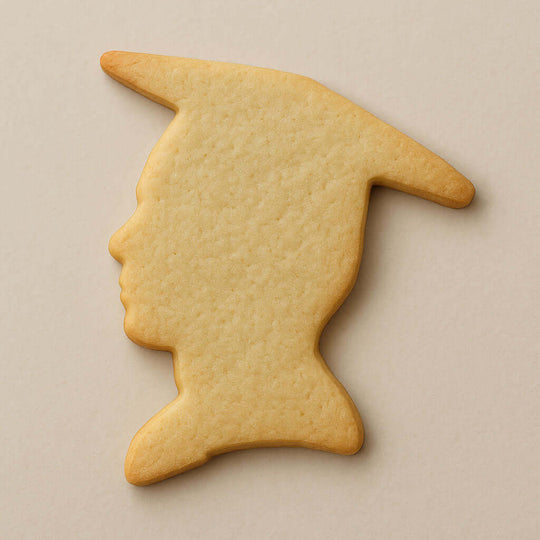 4.25 inch Graduation Boy Metal Cookie Cutter shaped cookie silhouette on a neutral background.
